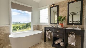 Bathtub, hair dryer, towels, soap