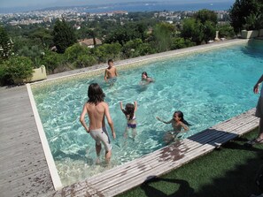 Outdoor pool, open 8:30 AM to 9:30 PM, pool loungers