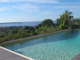 Outdoor pool, open 8:30 AM to 9:30 PM, sun loungers