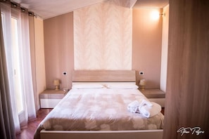 Desk, blackout curtains, free WiFi, bed sheets