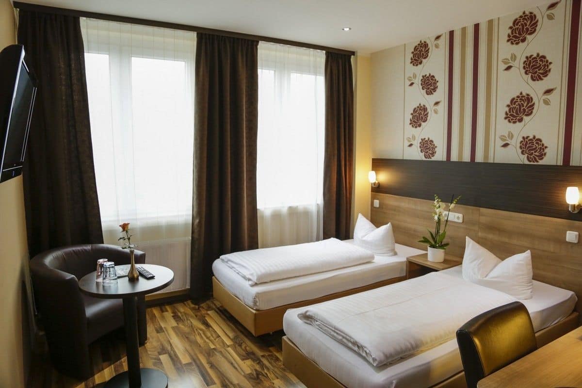 Double or Twin Room | Minibar, desk, blackout drapes, soundproofing