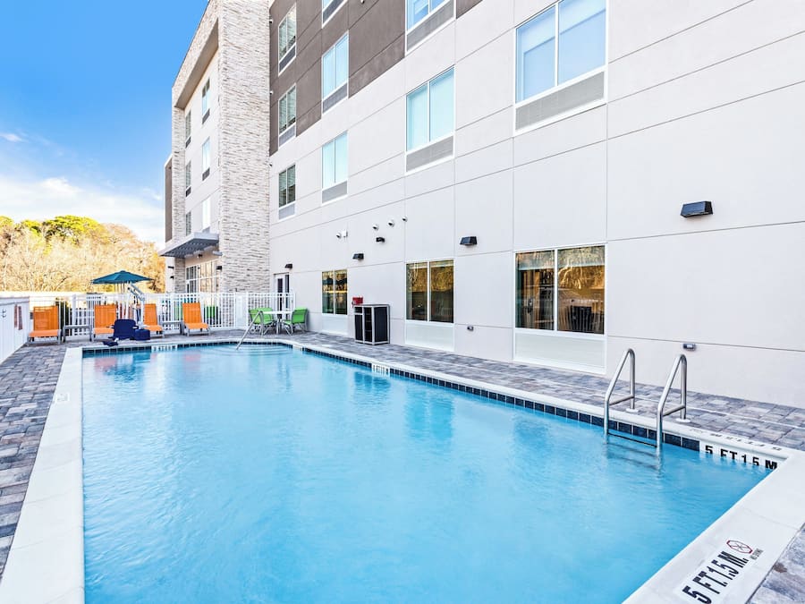 Outdoor pool, open 6:30 AM to 11:00 PM, pool umbrellas, pool loungers