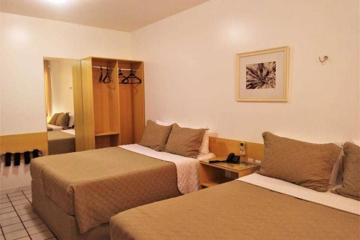 スーペリア 4 人部屋 | ミニバー、WiFi (無料)、ベッドシーツ