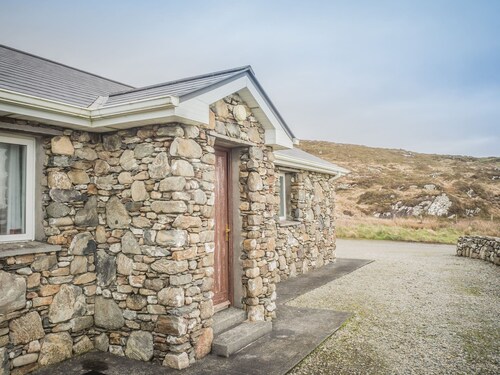 Errislannan Stone Cottage offers plenty of space and fabulous views.