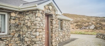 Errislannan Stone Cottage offers plenty of space and fabulous views.