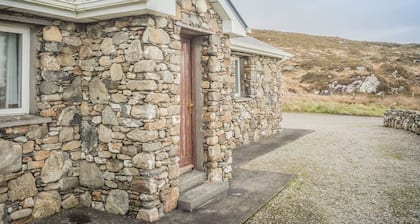 Errislannan Stone Cottage offers plenty of space and fabulous views.
