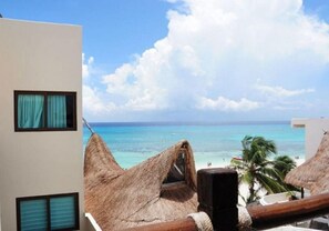 On the beach, sun-loungers, beach towels