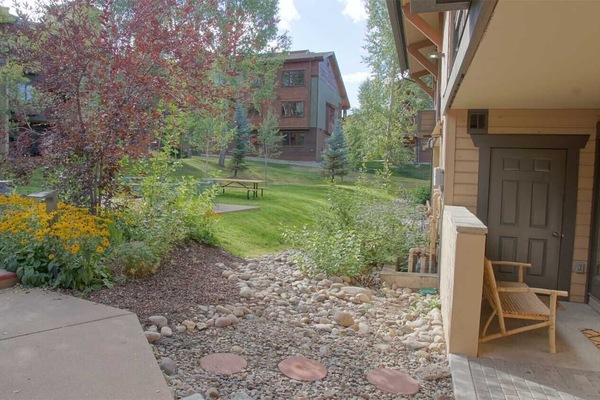 Patio with direct access to BBQ & picnic area, pool, hot tubs, sauna, clubhouse