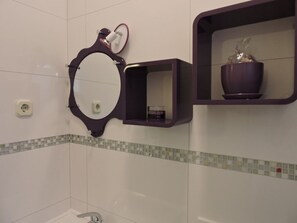 Bathtub, hair dryer, towels