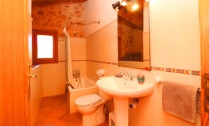 Bathtub, hair dryer, towels