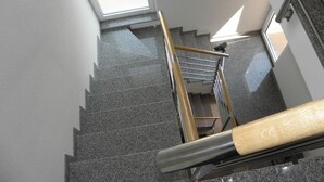 A staircase with granite steps and metal railings. - Apartment in Premantura with Seaview, Terrace, Air condition, WIFI (3352-29) (Premantura)