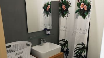 Hair dryer, towels, soap, shampoo