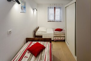 1 quarto, Wi-Fi de cortesia, roupa de cama