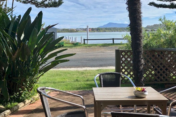 right opposite the river.