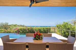 Outdoor dining - 3-bedroom, 3-bathroom home on large private lot with ocean view! (Playa Grande)