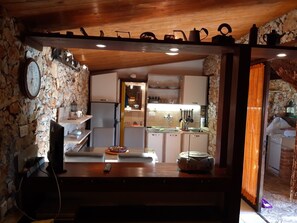 Fridge, coffee/tea maker, electric kettle, cookware/dishes/utensils