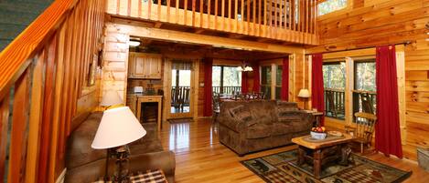 Flatskjerm-TV, peis, DVD-spiller og bordtennis