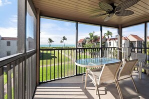 Outdoor dining - Partial Beach View 2 bed, 2 bath at Sanibel Moorings #1012 (Sanibel)