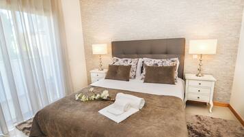 Coffres-forts dans les chambres, fer et planche Ă repasser