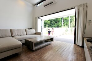 Private Vacation Home | Living area | TV, DVD player - The Stella Hamahiga (Uruma)