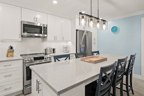 Fridge, microwave, oven, stovetop - Newly Renovated Partial Beach View 2 bed, 2 bath at Sanibel Moorings #411 (Sanibel)