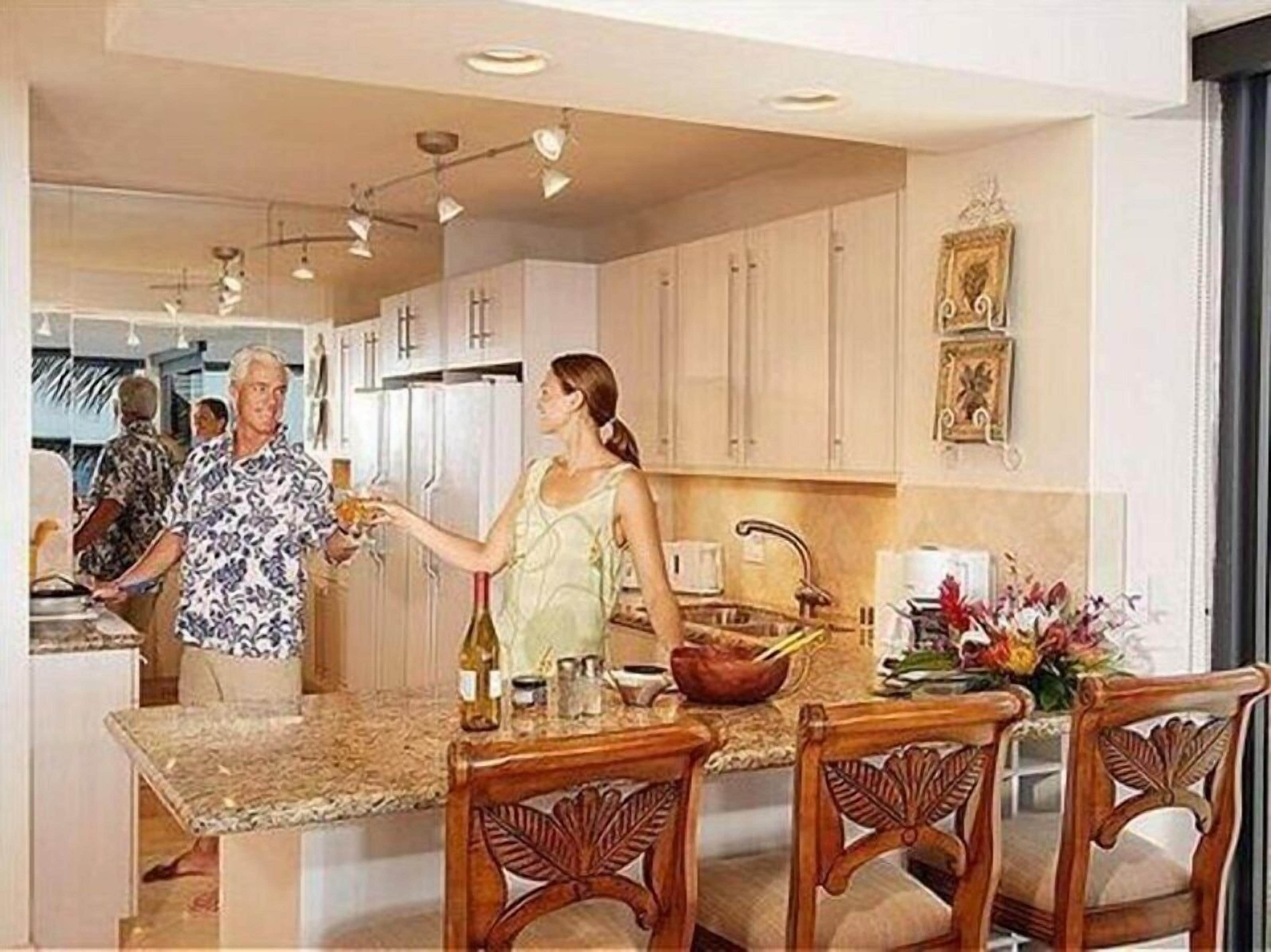 A modern kitchen with a central island, wooden chairs, and a dining area.