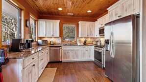 Private kitchen - Mountain Family Lodge: A spacious 7-bedroom retreat in Boone, NC, perfect for 28 guests. (Boone)