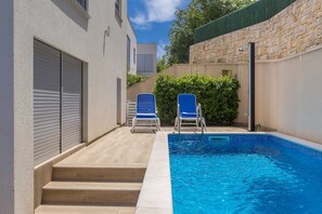 Piscine extérieure, piscine chauffée