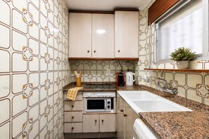 Fridge, microwave, coffee/tea maker, electric kettle