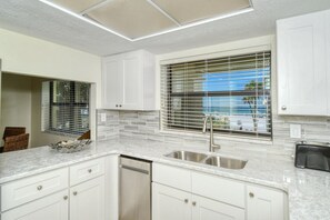 Fridge, microwave, oven, stovetop - Beautiful beachfront condo with an ocean view steps from Siesta Key Beach! (Sarasota)