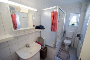 Bathtub, hair dryer, towels