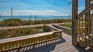 A wooden deck with a railing overlooking a beach. - Directly on the Gulf, Free Beach Chairs, Comfy Escape (Miramar Beach)