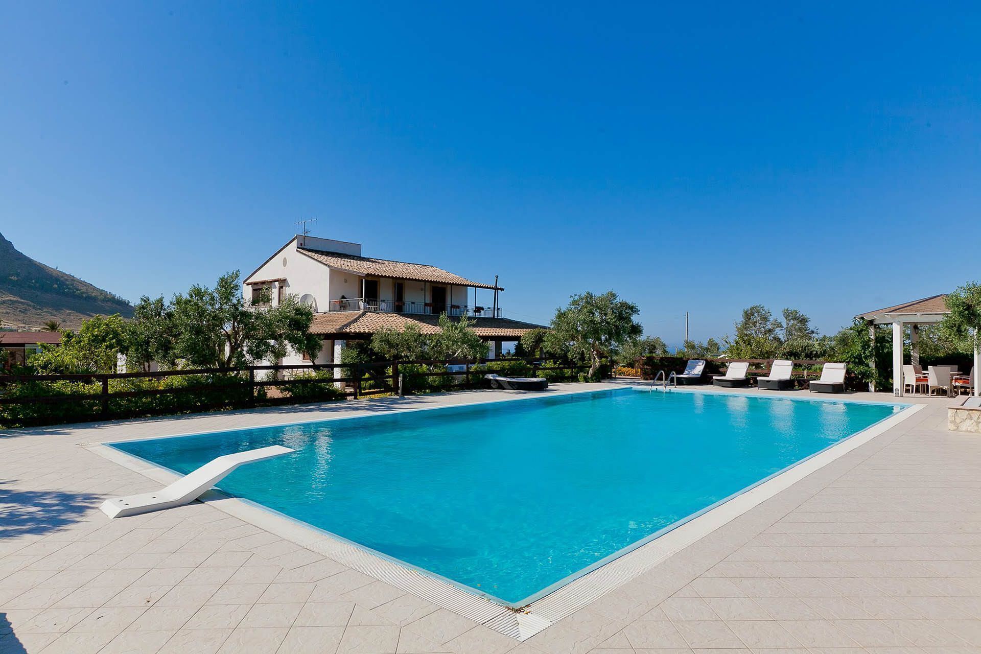 My Rental Homes - Villa Ophelia, surrounded by lush vegetation with swimming pool