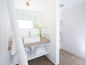 Bathtub, hair dryer, towels
