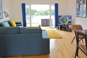 Ground floor: Open plan living space with sitting and dining areas seating six