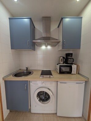 Fridge, microwave, coffee/tea maker, toaster