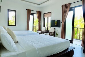 Deluxe Family Room | Minibar, desk, blackout drapes, soundproofing - Puravida Villa (Da Nang)