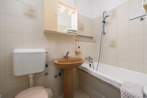 Bañera, toallas