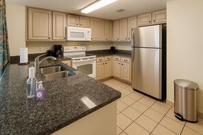 Fridge, microwave, oven, stovetop - Beachfront 2-bedroom condo steps to Myrtle Beach Boardwalk (Myrtle Beach)