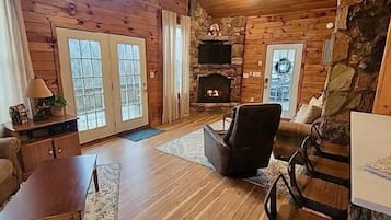 Smart TV, fireplace, DVD player, books