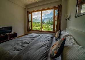 Habitación superior | Ropa de cama de alta calidad y edredones de plumas