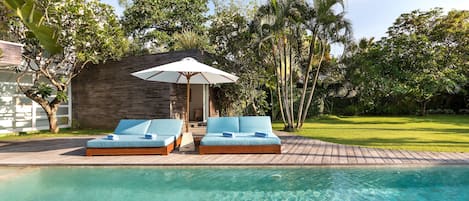 Indoor pool, outdoor pool, pool umbrellas, sun loungers