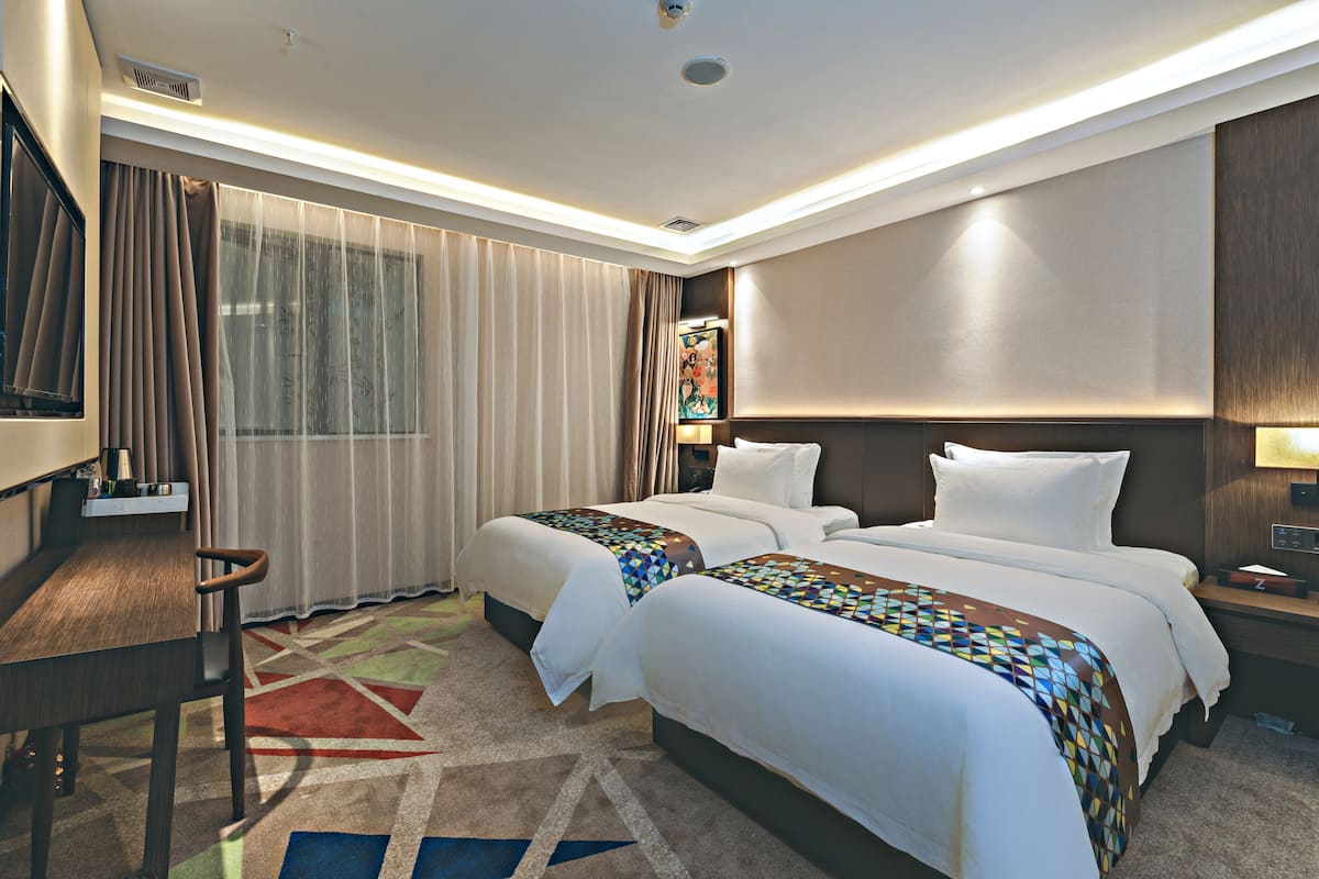 Boutique Twin Room | Desk, blackout curtains, soundproofing, iron/ironing board (on request)