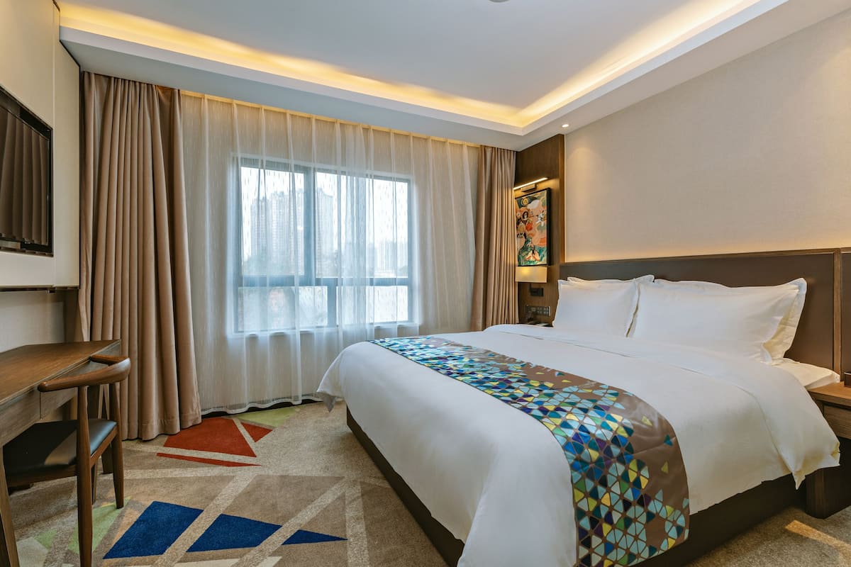 Deluxe Double Room | Desk, blackout curtains, soundproofing, iron/ironing board (on request)