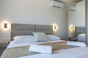 4 habitaciones, tabla de planchar con plancha y cuna de viaje