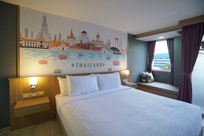 Habitación doble Deluxe, 1 cama King size | Caja de seguridad en la habitación y decoración personalizada 