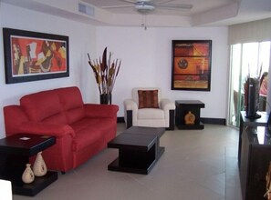 TV, books - Bvg Marina Luxury Condo Ocean View - a Sight to Be Seen (Unknown)