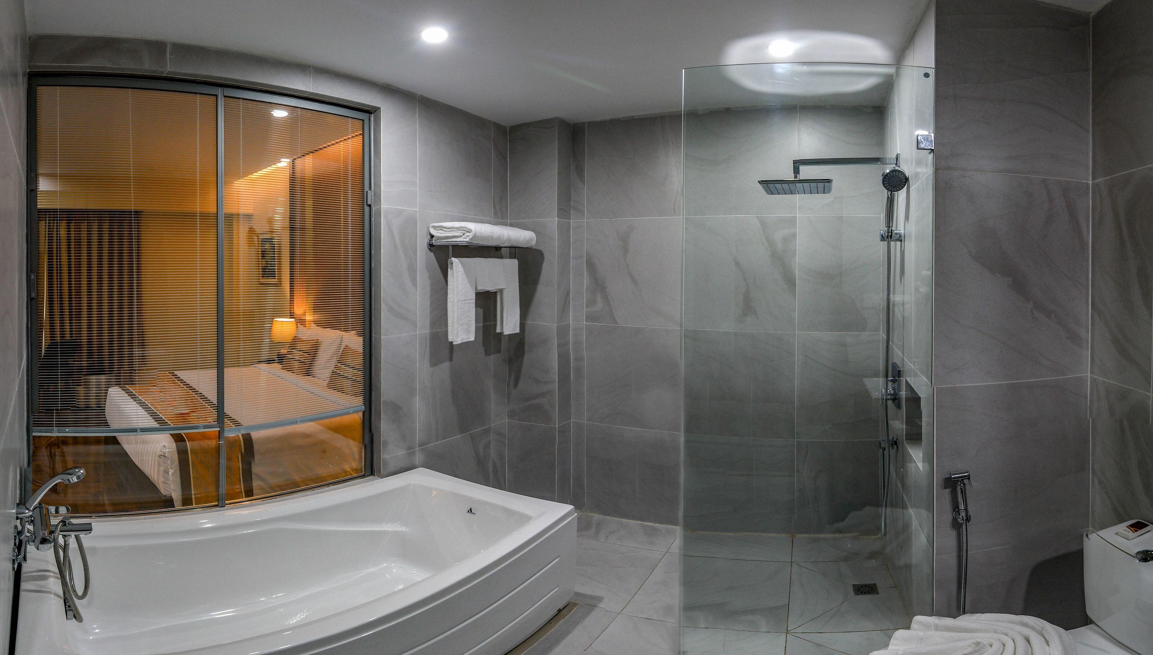 suite | bathroom | free toiletries, hair dryer, slippers, towels