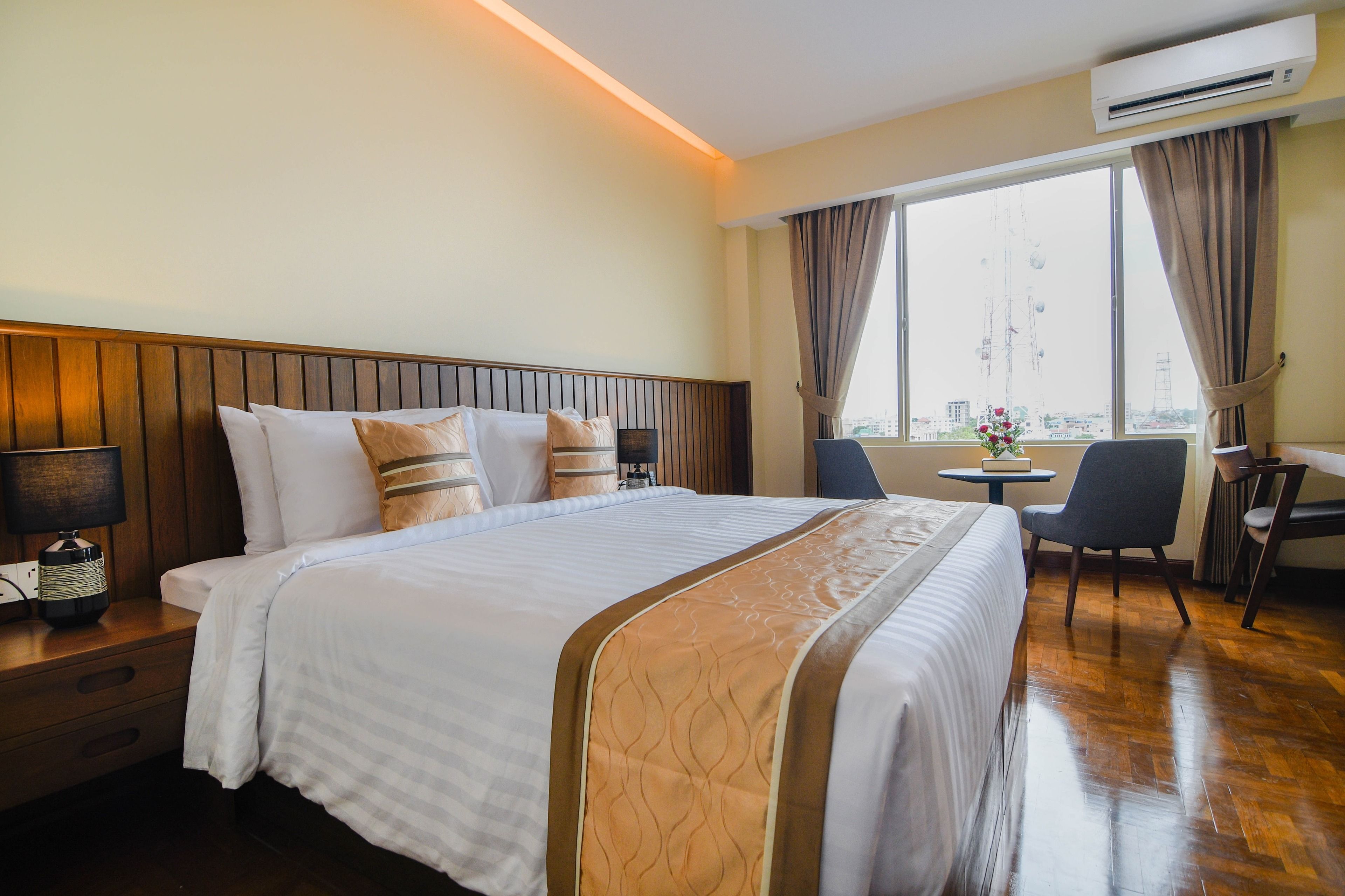 deluxe double room | minibar, in-room safe, desk, laptop workspace