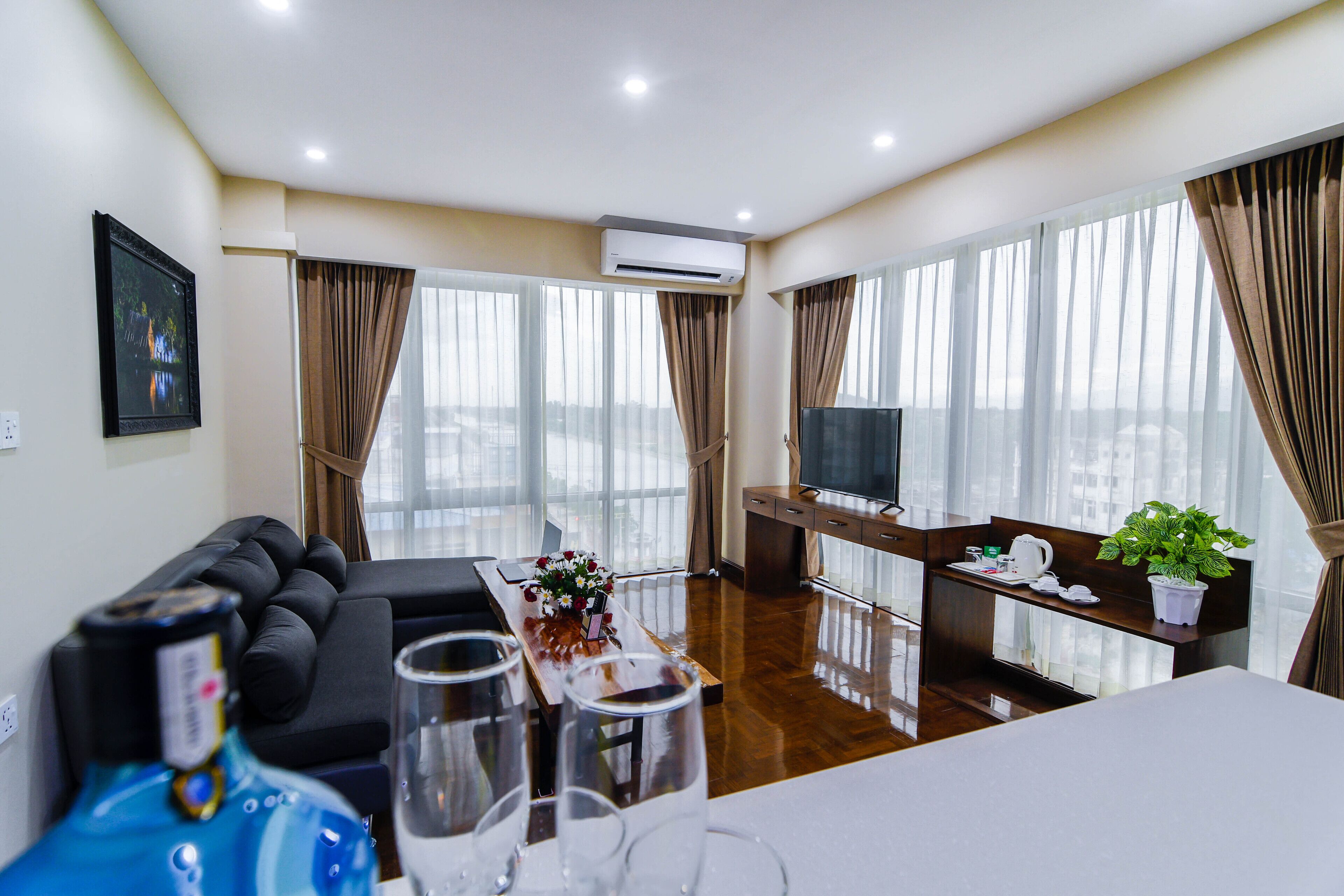 premium suite | living area | 42-inch flat-screen tv with cable channels, tv